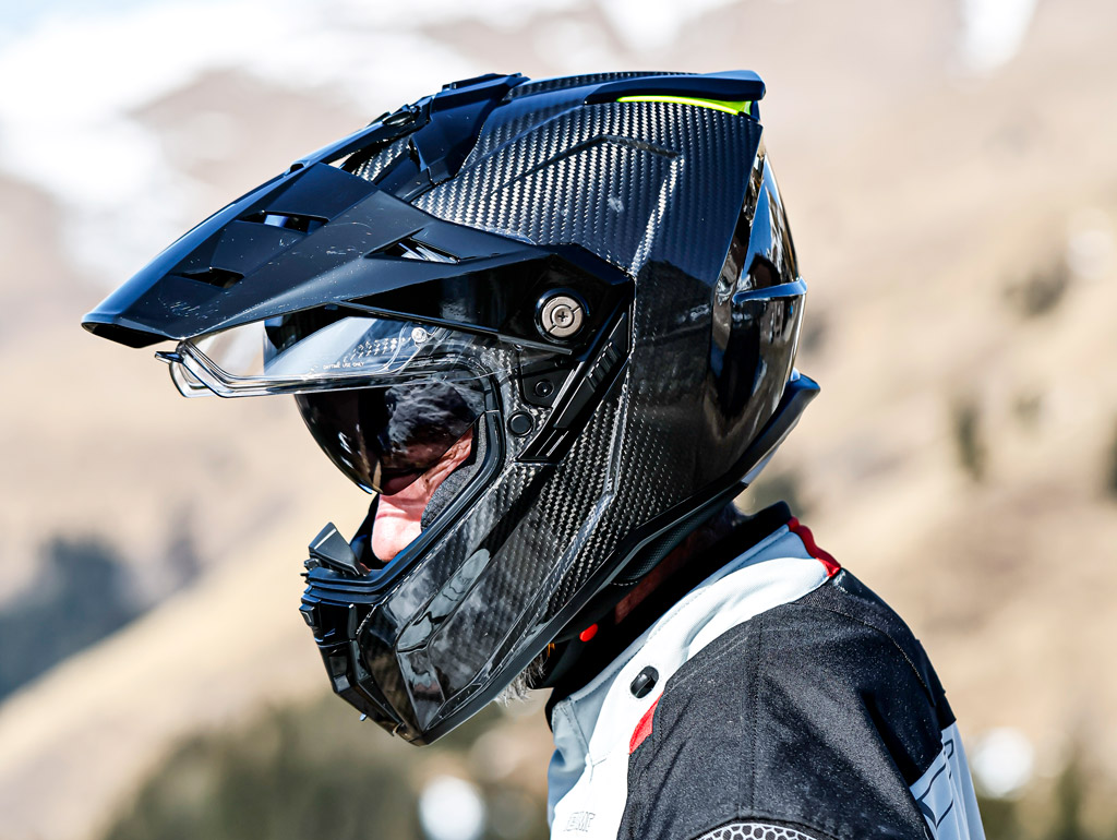 Caberg Tanami Carbon helmet with a carbon shell, being worn