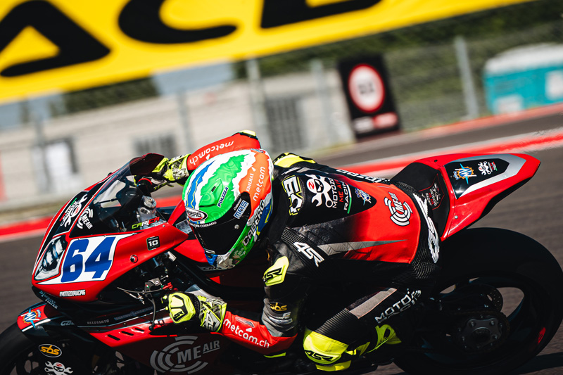 Federico Caricasulo on his bike wearing the Caberg GP01 racing helmet