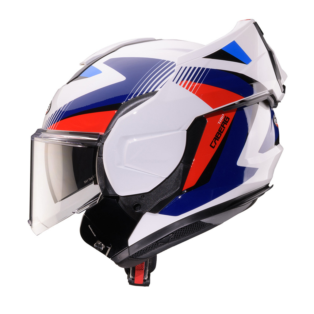 Caberg Trip Lunar helmet in white/red/blue/light blue color scheme, side view with chin guard raised.